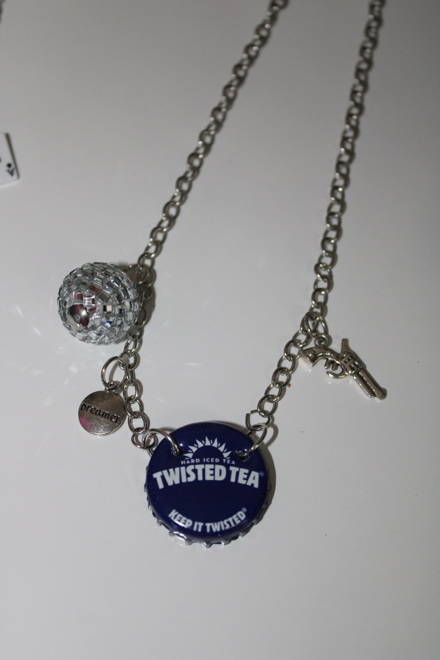 Twisted tea bottle cap necklace