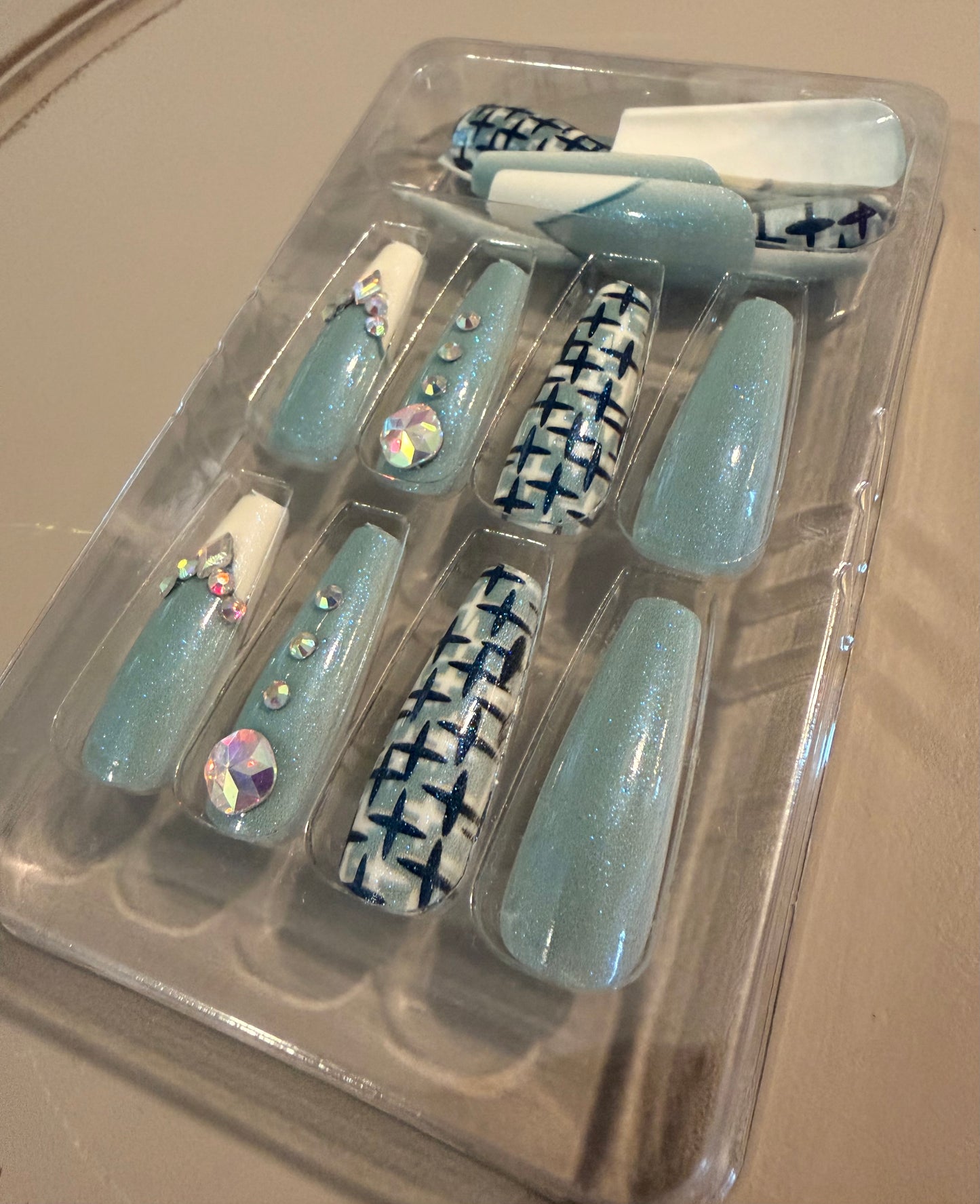 Dena Blue Cross Nails